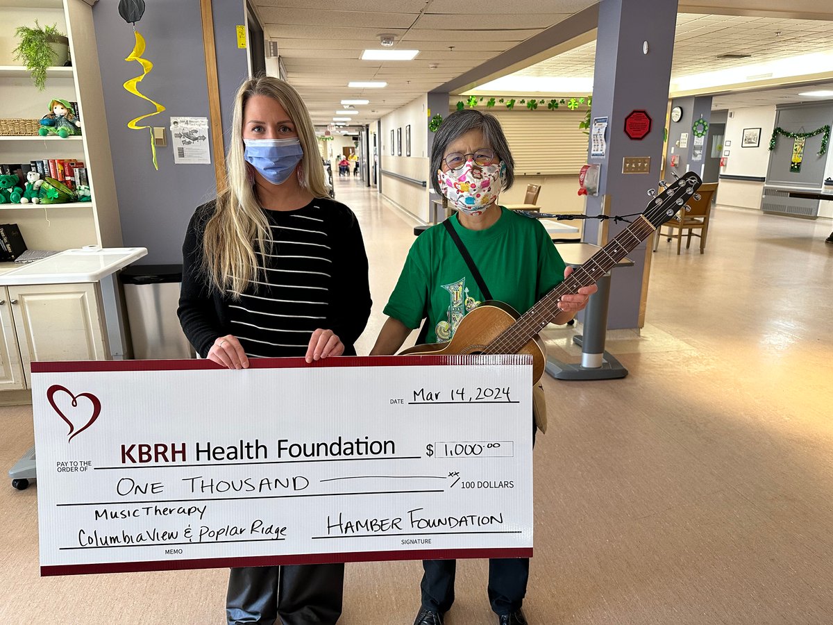 rory holding a big cheque